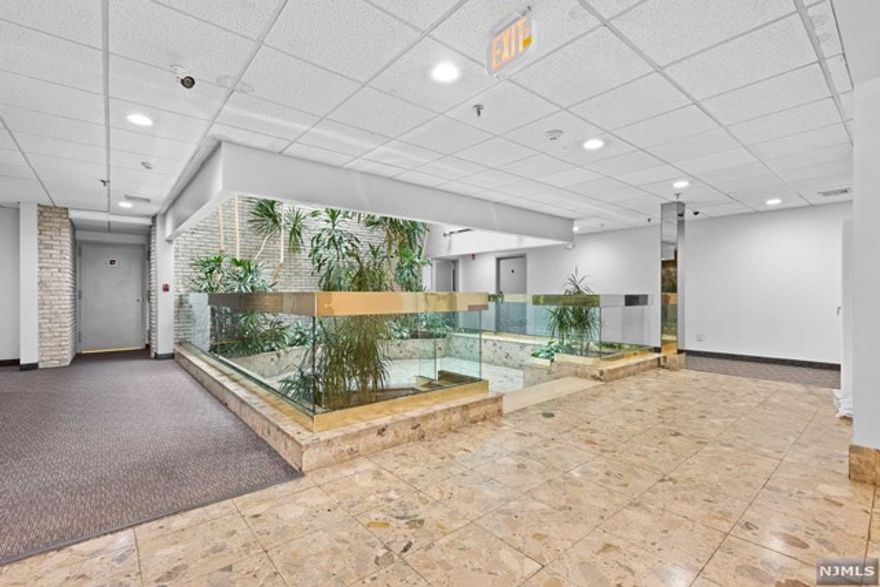 Ideally located is this first-floor condo. Why rent when you can own! Enter into the tiled foyer that leads to the half bath. The living room opens up to the ground level patio. The kitchen is functional and efficient with laundry. The master bedroom suite has a full bath and closet. Easy access to Route 17 and Route 80- a commuter's dream!