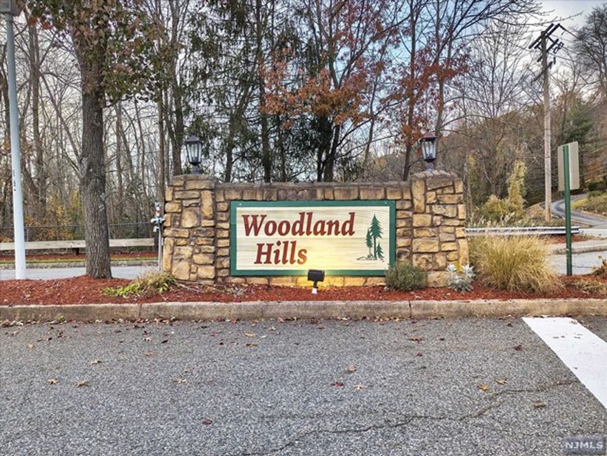 Second floor end unit in Woodland Hills! Features Eat-in Kitchen, Formal Dining Room, Living Room with sliders to deck. Master Bedroom with huge walk-in closet and master bath. Nice sized second bedroom with double closets. Amenities include pool, clubhouse and playground area. Low HOA fees, which are paid quarterly. All appliances will stay. Not FHA Approved. Shopping, restaurants and schools nearby. Close to major highways, buses and trains. Room sizes are approximate. Sold in "As is" condition. No known issues. Move in fees include $250.00 application fee, $250 capital contribution and $579 escrow all due at closing.