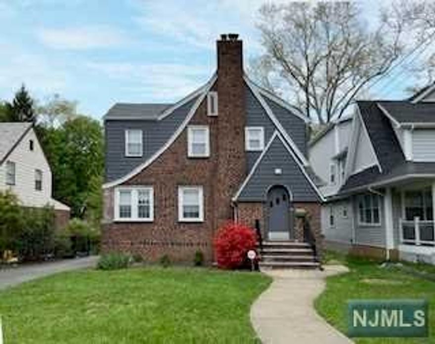 First floor features an entry foyer, living room with fireplace, sunroom and open floor layout for the kitchen, dining room, and large family room. An office, powder room and oversized attached garage complete this floor. The second floor features a master bedroom with walk In closet and master bathroom. Three additional bedrooms, full bathroom and laundry on this floor. Full finished basement, large deck and fenced in backyard. Located in heart of town close to schools, NYC transport and more.