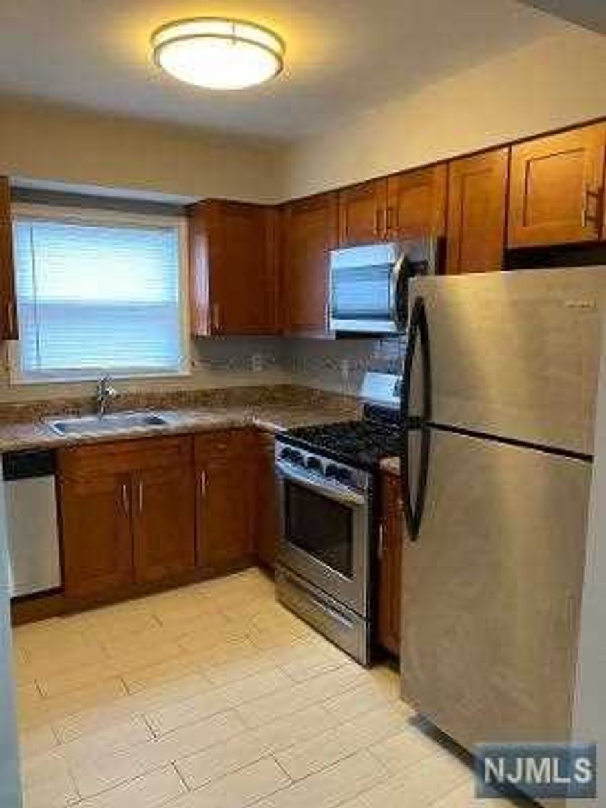 Updated and clean 1 bedroom spacious apartment conveniently located near major roads, highways, schools, shopping, house of worships, parks, and public transportation. Apartment features 1 bedroom 1 full bath, hardwood floors that will be refinished, cherry kitchen cabinets and an updated bath.Heat, water and gas included in rent along with 1 parking space.