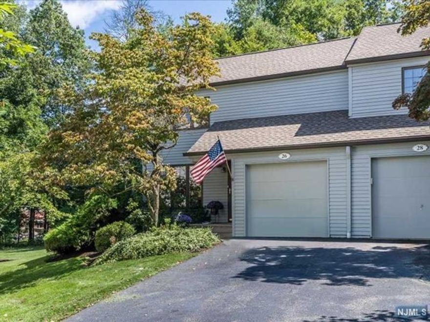 Carefree condo living on a quiet cul-de-sac in the desirable Stonegate community! Sunny two Bedroom End Unit with a versatile open floor plan that provides easy flow for entertaining and comfortable living. Kitchen with white cabinetry and Breakfast Nook opens to Dining/Den area and large Living Room with wood burning fireplace, cathedral ceiling and sliders that open to the Patio. Nicely updated Powder Room and access to the Garage. Upstairs you will find two generously sized Bedrooms, each with their own Bath and ample closet space. The lower level houses the Laundry, storage and mechanicals and offers the potential for even more finished space. Convenient to local elementary school, shopping, dining and major highways. All this and low taxes too!