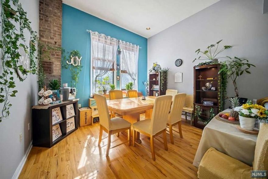 One of a kind Weehawken LOFT style 2 bed 2 bath condo is available for sale. This spacious unit is over 1100 sq ft and boasts 12 ft ceilings, exposed brick, custom built windows, hardwood floor, custom tiles in bathroom, and Jacuzzi bathtub. The modern kitchen comes complete with stainless steel appliances and beautiful granite counter top. Located in the downtown shades area of Weehawken which is conveniently located near schools, shops, major highways, and well connected to NYC Bus, Light Rail and Ferry. Walking distance to Hoboken. Your new Home is calling you! Come take a look and don't miss out!