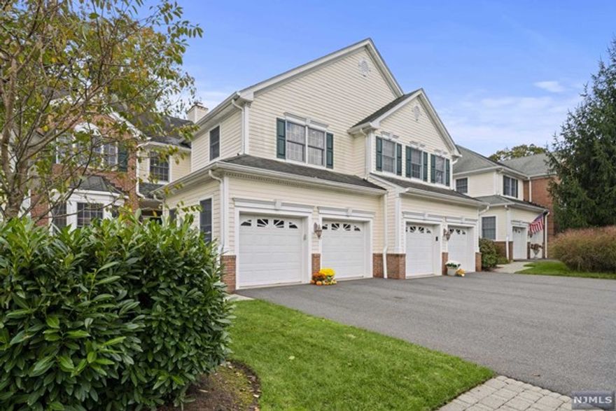 Discover this sophisticated 3BR, 2.5BA townhome, boasting a captivating 2-story entry flooded w/ natural light. The home exudes elegance & comfort w/ modern amenities. Step into the heart of the home where the family rm w/ gas fireplace & dining rm showcase exquisite custom moldings & rich hardwood floors. A butler's pantry off the DR leads to a well-appointed kitchen featuring stainless steel appliances, granite countertops, center island & spacious eating area w/ sliders to patio. On the main level, you'll also find a convenient powder rm, laundry rm, and easy garage access. The bright 2nd-floor hallway leads to the primary bedrm suite w/ walk-in custom closet and luxurious primary bath w/ separate soaker tub, shower, and double sinks. 2 additional bedrms & a well-appointed hall bth complete this level. The finished lower level offers rec room/home office & ample storage. This townhome is the perfect blend of style and function. Don't miss the opportunity to make it yours!