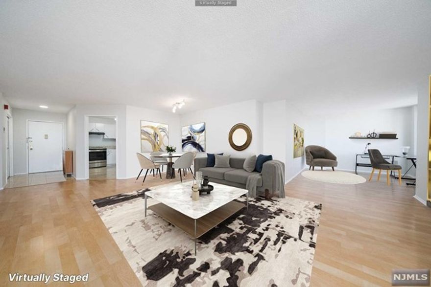 Welcome to 1408 Harmon Cove Towers, a 2 bedroom plus den, 2 bath unit for sale. Located on a high floor with sweeping, open views, this unit is one of the most popular layouts with 1,525 sq feet of living space. The bright and airy dining and living area with glass sliders that lead to a nice size balcony, makes this space perfect for entertaining. The eat-in kitchen is clean and fresh with a new upgraded stainless steel oven range and refrigerator. Large master bedroom boasts a walk-in closet and a beautifully upgraded master bath. Favorite feature of this layout is the den off the living room which offers flex space as either a home office, children's play area or can be closed off to create a 3rd bedroom. Freshly painted and laminate flooring throughout, this unit has been meticulously maintained and is move-in ready. Enjoy the many amenities of pet-friendly Harmon Cove Towers, including 24 hour security/concierge, covered parking & seasonal outdoor pool, to name a few