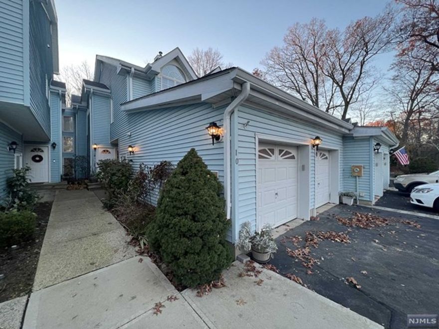 Welcome home to Foxwood Estates, a sought-after Old Tappan town-home community due to its convenience and privacy. This 2-bedroom, 2.5 bathroom rental boasts the deluxe layout (oversized) with a newly-renovated kitchen including all new stainless-steel appliances, along with brand new flooring that continues into the dining room. Spacious 2 car garage w/ shelving. Cozy living room with double-sided gas-lit fireplace that can also be enjoyed from the dining room. Private back terrace that backs up to private green/wooded area. Upstairs boasts the two oversized bedrooms, both equipped with en-suite bathrooms. Primary bedroom features his and her walk-in-closets, laundry, spa-like bathroom & a gas-lit fireplace. Foxwood Estates is next door to Northern Valley Regional HS - Old Tappan and up the street from Bi-State shopping center & Oakes Park. Also nearby are are elementary & middle schools and places of worship. Tenant pays their own utilities. No pets please. Available 12/1!