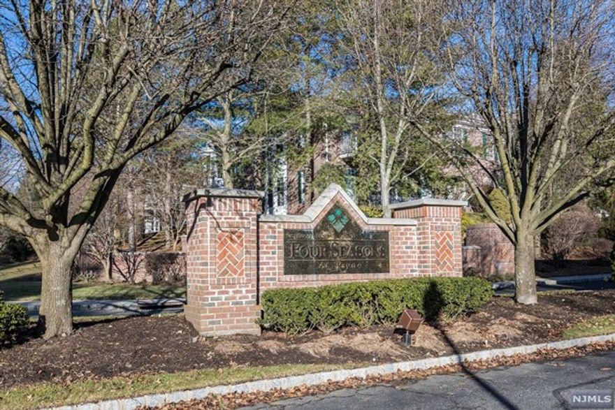 Welcome to Four Seasons at Wayne 55+ Active Adult Community! Ideal End Unit is Bright and Spacious and Features Oversized Living Room & Dining Room w/Gleaming Hardwood Floors, High Ceilings, Fresh Paint, Crown Moldings, Updated Modern Eat In Kitchen w/New Appliances, Sliders to Terrace, 2 Year old Furnace, Master Bedroom with Master Bath, Walk In Closets, Guest Closet, Laundry Rm w/Washer & Dryer, Indoor Parking Garage, Storage Room & shared Storage Closet in Hallway. Just pack your bags!