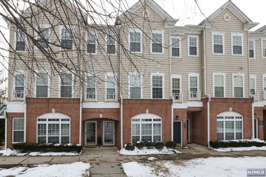 This Pristine 1729 Sq Ft 2 bedroom 2 1/2 bath with den townhome located in the desirable Essex Park, a gated community across from Hendrick Field Golf Course. This Davenport Model features, hardwood throughout, including newer mahogany engineered hardwood on the third floor, gourmet kitchen with granite and SS appliances, dining-living area with an open flow great for entertaining, large master suite with soaking tub and custom walk-in closet and a den that can used as a third bedroom. Walk out your front door to a beautiful gazebo area and Enjoy the salt water heated pool during the summer months. Essex Park is close to all major highways and transportation including the Newark Light Rail.