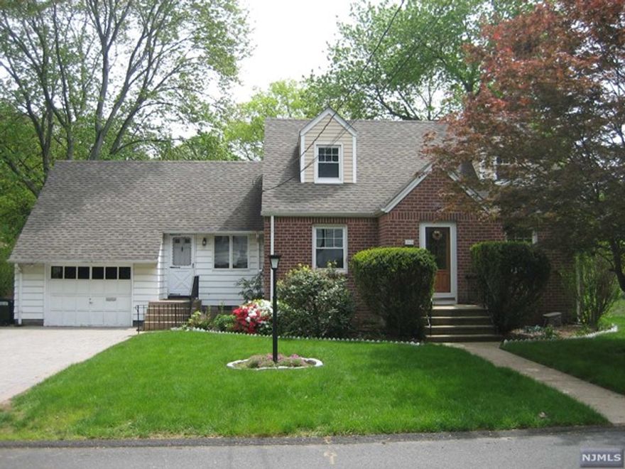 Pristine cape offers flexible floor plan in desirable neighborhood with award-winning schools. This well maintained home comprised of inviting living room, sun-filled dining room, modern eik, updated full bathroom, 2 bedrooms on 1st floor, and a spacious family room in basement. 2nd floor boasts 2 bedrooms and added full bathroom. Newer c/a/c, hardwood floors throughout, ample closet/storage space, fenced backyard, and more. House will be professionally painted. No pets.