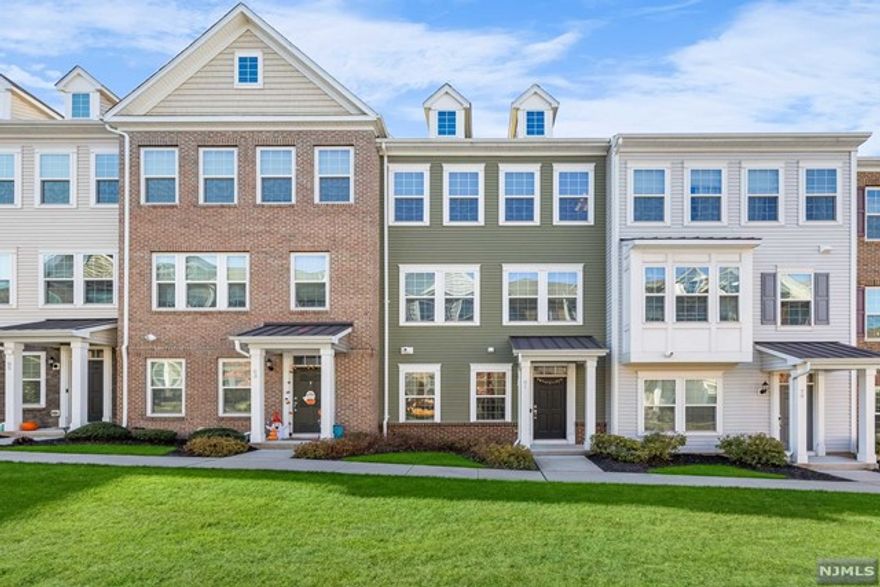 Call 609.619.2198;FINEST & sought after Colonial Style Luxury townhomes in North NJ;Wesmont Station Community in Wood Ridge.30 mins from Manhattan,close to major turnpike & freeways,offers ease of commute to NYC;Rare to come by updated & custom made layout offering amazing sized 3 bedrooms(all the bedrooms come w/an en-suite full baths)a total of 3 full+1 half bath,4 park space;2 car garage & 2 car driveway.1st floor offers open layout, modern updated kitchen,huge pantry & oversized island, half bath, large dining space,massive living area & a great sized outdoor deck.3rd floor has primary bedroom suite w/full bath,large walkin closet,3rd huge bedroom with its own full bath,massive walkin closet;laundry room w/storage on this level;whole house water filtration.Easy NYC & Local NJ commute;train station just 10 mins walking & option of 2 buses going into NYC that runs every 10-15 mins.Hassle-free community living at its best,coffee shop,sports field, kids park,dog park so much more.