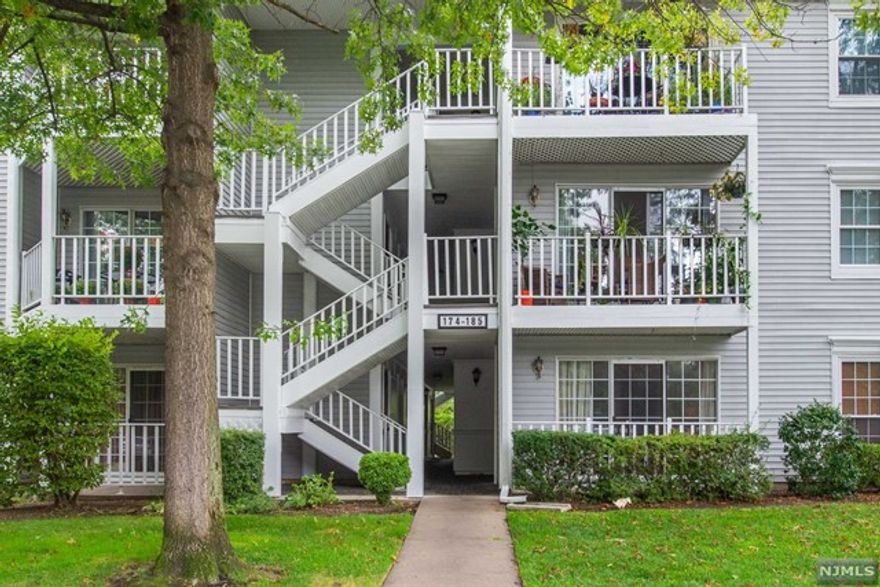 First floor unit with no steps and a large walk-out patio that backs up to the woods giving you privacy. This one floor condo has a master bedroom with large walk-in closet and updated master bath (2017). The second bedroom has a double closet and the Elfa desk system is included. Both bedrooms have Elfa closet systems and new carpet. The hall full bath was updated in 2015. Other features and updates include: furnace 2014, stainless steel appliances, in-unit washer/dryer, exterior storage room with shelves and one reserved parking spot. Enjoy the amenities this wonderful community has to offer including a pool, tennis, community room and playground. Close to Route 17, Route 287 and NYC Bergen train Line at Ramsey Route 17 (large parking garage).