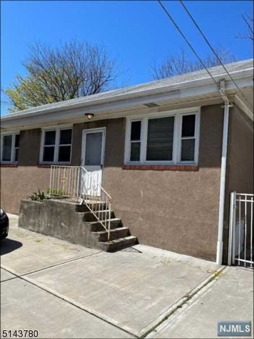 Unique option to rent your own little house in the back of a multi family. Recently updated and renovated 2 bedroom, 1 bath with bonus walk in closet or office space. Newer floors, windows, oven with air fryer, and refrigerator. Sun-filled dining room and living room with open concept kitchen - ideal for entertaining and gathering. One off street parking spot. Near shops, restaurants, schools, house of worship and minutes to Garfield train station with easy access to Penn station, ferry or path. Come enjoy the vibrant Garfield shopping and restaurant options and the River Road parks, walking trails and beautiful Post Ford Park with stunning Passic River Waterfalls.to Penn station, ferry or path. There is no washer/dryer in the house. No smoking, no pets. PHOTOS PRIOR TO CURRENT TENANT. Unit will be professionally cleaned when tenant moves. Available either 9/1 to 9/15.