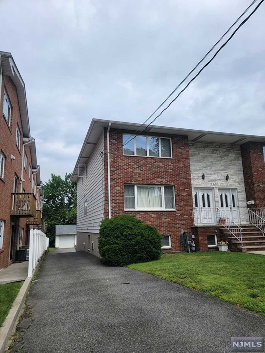 3Bed and 2&1/2 Bath over size duplex is located only one block from Broad Ave.Spacious every rooms have a lots of closets.Kitchen is updated recently Hardwood wood floor through out.Garage and parking space is included. No Pets, No smoking.