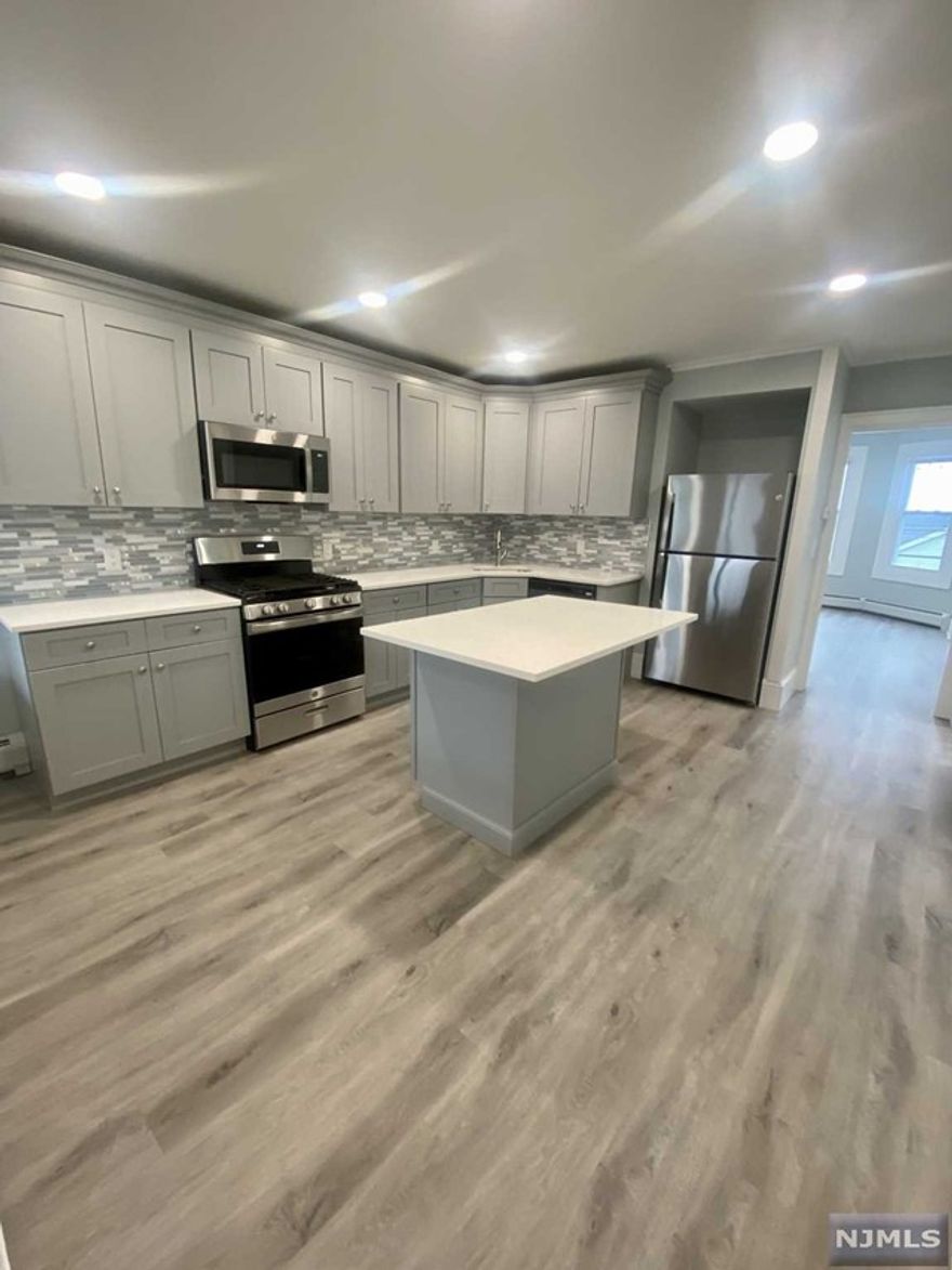 Unit #3 Beautiful, completely renovated, 2 Bedroom apartment featuring a brand new gorgeous Chef's Dream kitchen with granite counters & tile backsplash. All brand new stainless steel appliances included: gas stove, refrigerator and dishwasher! New Washer/Dryer in unit provided. Brand new, large full bathroom, recessed lighting and all new flooring. Have a lot of stuff .... Bonus 3rd floor, exclusive use, huge storage space. Absolutely no pets & no smoking! All utilities to be paid by tenant except water. Street parking. Tenant pays 1.5 month security deposit, 1 month real estate fee plus 1st month rent upon lease signing. Don't miss this wonderful apartment available immediately!