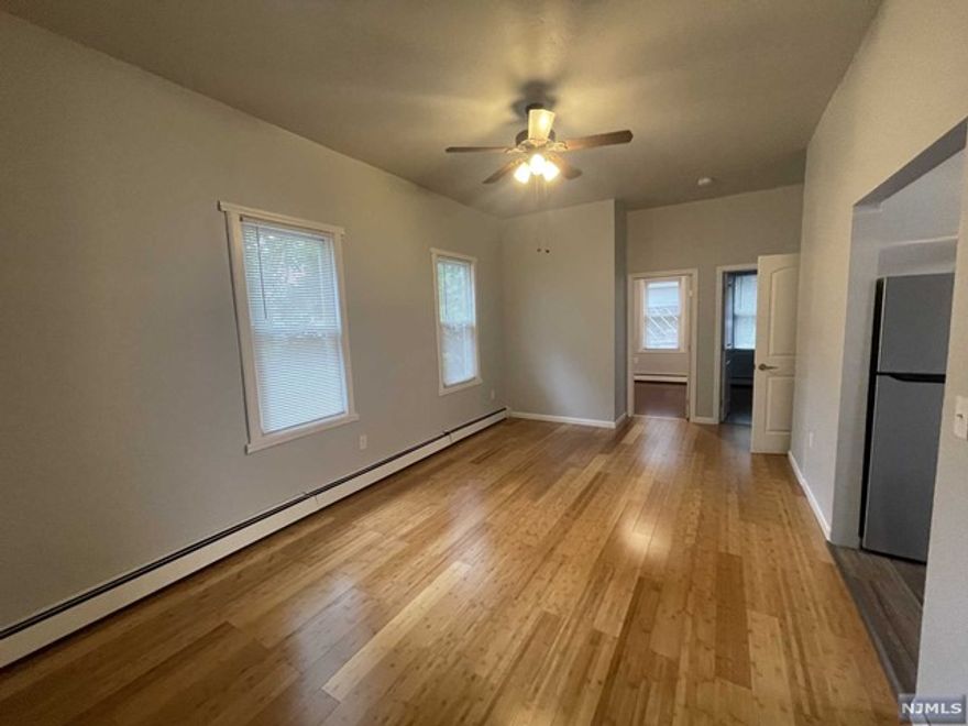 1st floor apartment in Wallington, NJ is now ready for rent. The cozy 3 bedroom apartment, full bathroom, living room and eat-in-kitchen has been recently renovated and freshly painted. The unit offers new floors, new kitchen, new lightning, washer/dryer hook ups and designated storage area in the basement. Use of yard. Street parking only and no smoking. Walking distance to shopping, parks, restaurants and transportation. Don't wait, set up your appointment today. Credit report and proof of income required. Tenant will need 1.5 month deposit, and 1 month real estate fee due at the signing of the lease. First Month's rent is due on the day, when keys for moving purposes will be picked up.