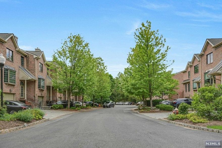 A luxury Townhome impeccably well maintained on a private cul-de-sac. Master suite w/ensuite bath, jacuzzi tub, WIC and 2 other closets. All the closets are custom. Three sided gas fireplace between DR & LR. Modern EIK w/ Maple cabinets, granite counters, SS appliances and sliding glass doors to 2nd floor deck perfect for morning coffee or a summer evening BBQ. Ground level access to patio, full bath and rec room w/wet bar, front load washer & dryer in laundry room. 1 car garage, central vac, wood floors, alarm, intercom, blue ribbon schools, swim club.