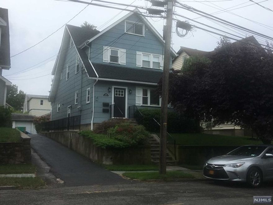 Beautiful move in condition, Two Bedroom 1st floor apartment with finished basement...2 full baths, central air, new hardwood floors, washer/dryer supplied, off street parking, use of yard. Tenant pays all utilities except cold water.