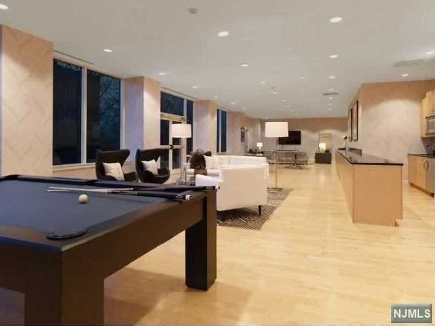 Clean luxury 2-bedroom/2-bath corner unit. Expansive floor-to-ceiling windows and a view of New York City. Easy commute to NYC. - 5min walk to bus stop (154 to NYC). Convenient location near plenty of food options on Broad Ave, Fort Lee and Edgewater. Quick and convenient access to NJ-4, Route 80, I-95 Turnpike and George Washington Bridge. BRAND NEW Samsung W/D, NEW hardwood floors. Many upgrades and modern interior design and finishes - Granite kitchen and bathroom countertops - Ceramic Tile floors - Glass showers - Rich wood kitchen cabinets PROPERTY AMENITIES: - Covered Parking Garage (2 tandem parking spots) - Fitness Center - Conference Room - Residential lobby - Concierge services - Yoga Room - Dance Room - Business Center - Homeowner's Multi-purpose Room/Lounge - Kid's playroom -Digital Golf Driving Range simulator