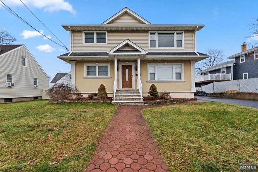 Welcome to this beautifully maintained 2nd floor two-bedroom unit in thriving Elmwood Park. Enter through the front door to the common area. Continue up to the unit entryway w/ extra-large tiling. The bright kitchen w/ SS appliances & a brand new fridge is more than spacious enough to accommodate a table w/ chairs. Lots of cabinet space. The LR w/ closet to attic space & hardwood flooring w/ a double window is a great place to relax. The newly renovated bathroom with bonus storage closet has all of today's modern finishes and aesthetics. The unit is completed with two sizable bedrooms with hardwood flooring and both with double closets and two windows. Tenant will have access to shared laundry machines in the basement. Tenant will have shared use of driveway. Pool/yard is not included. Tenant responsible for gas, electric & cable/internet & $150 of each repair. Credit check, interview required & tenant required to obtain renter's insurance. No pets. Truly a beautiful unit!