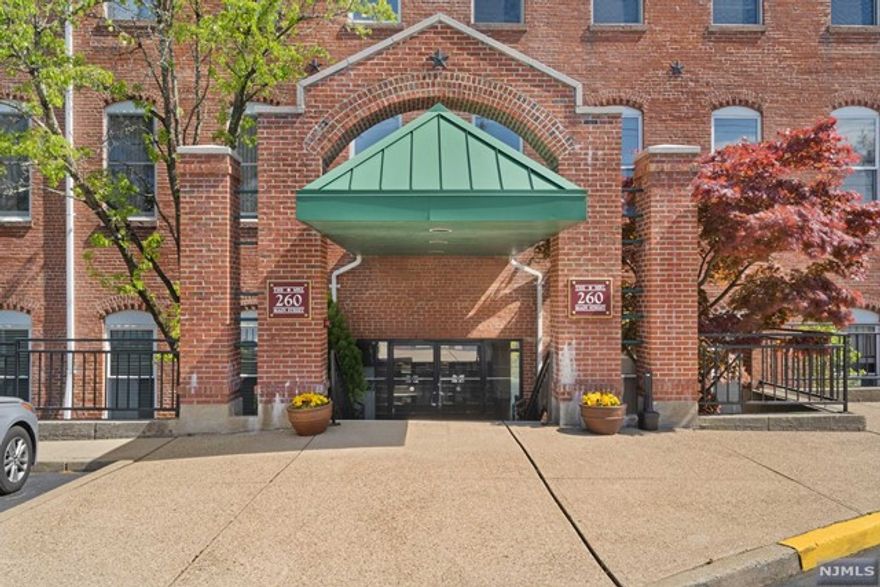 **BEST AND FINAL OFFERS BY WEDNESDAY 5/15 AT 10AM** Experience historical charm and contemporary comforts in this expansive one-bedroom condo at The Mill in Little Falls with unbelievable direct views of the falls! This residence boasts an architectural allure that creates a welcoming and stylish atmosphere. The living/dining area is accentuated by a dramatic brick wall, eye catching stone fireplace and lofty ceilings, bathing the space in natural light from the newly installed windows. The kitchen features granite countertops and stainless steel appliances, ideal for your culinary explorations. The luxuriously updated bathroom includes storage and a washer/dryer combo for ultimate convenience and elegance. Enjoy the comfort of a brand new HVAC system, hot water heater, high end flooring, bathroom and kitchen.