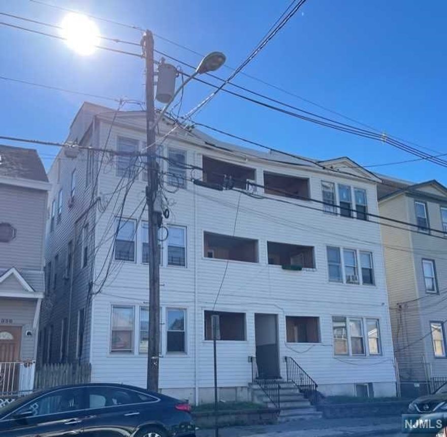 Cash Cow!! Legal 7 Unit building with green card. All units have 4 bedrooms! Generating over $12k a monthly in rental income! Hurry, an income generator like this won't last long!