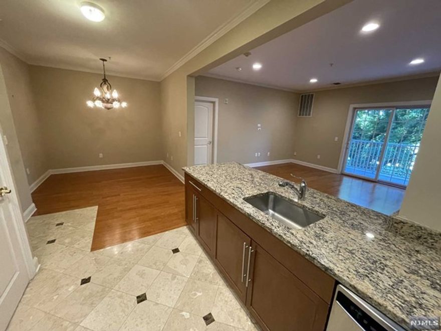 Tastefully renovated and well maintained spacious unit, boasting updated floors and finishes. Granite counter tops, stainless steel appliances, Large Custom closets, patio with golf course views and more! Garage parking spot included plus plenty of visitor parking. In unit washer/dryer. Community room and well equipped exercise room. Located off of route 4 east for easy commute to NYC, shopping, major highways, etc.