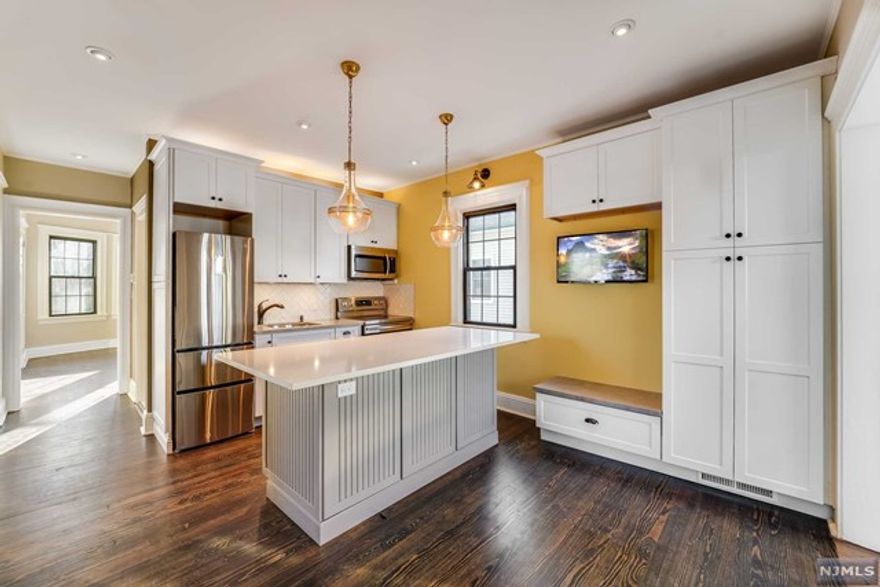 Welcome to your new home! This impeccable 2 Bed/1 Bath has luxurious features such as all new SS appliances, laundry in unit, brand new kitchen with stone island, brand new bathroom with gorgeous subway tile and new plumbing system, wall-mounted 4G TV, and it doesn't stop there! The exterior of your home also has new landscaping, new driveway, exterior lighting, and new paver patio. With each of your 2 bedrooms come custom closets, and for some extra sunlight you can sit at your enclosed front porch surrounded by new efficient thermal pane windows. This unit has two entrances, and a full unfinished basement for storage! 2 Outdoor, uncovered parking spots. Matterport available. Schedule your viewing today!