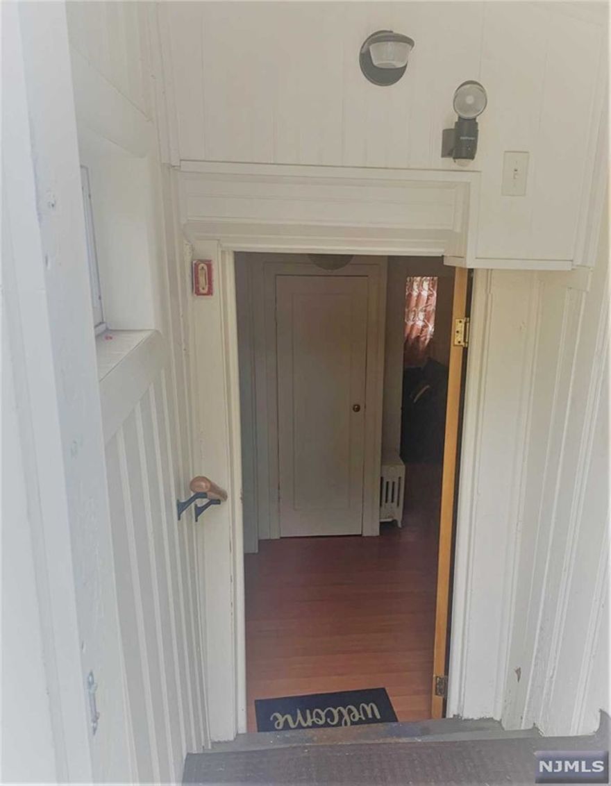 Beautiful 1 bedroom, 1 bath, ground floor apartment centrally located near everything! Heat/Hot water, Elec. & Gas included. Ideal for commuting to city, just steps to NY transportation! Private entrance and lots of closet space. One off-street parking provided. Available July 1st!