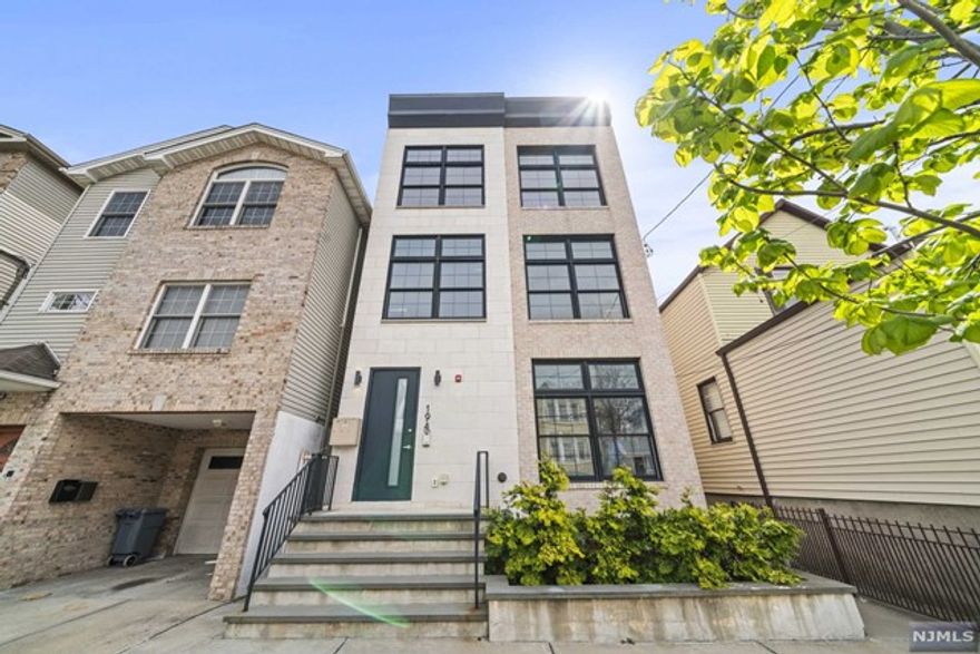 Welcome to 194 CAMBRIDGE AVE Condo #1. A beautiful boutique condo building built in 2020. This unit features 3 spacious bedrooms and 2 full bathrooms, both with double vanities. Engineered hardwood floors throughout. Stainless steel LG and Samsung appliances. Quartz countertops, and plenty of cabinets and storage in the kitchen. Washer and dryer in unit Featuring 15-foot soaring ceilings gives a remarkable home feeling. The living room and master bedroom have sliding doors opening up to 500 sq feet of private backyard space. Two newly built decks in the backyard await, perfect for BBQs, and entertaining friends and family, as well as a perfect place for your kids to play. Close to the main streets Central Avenue and Palisade Avenue shopping and more. Close to all restaurants, coffee shops, and parks (2 blocks from Washington Park and a 10-minute walk to either Riverview Park or Pershing Field Park), the New Jersey light rail, very easy commute into NYC. A commuters dream