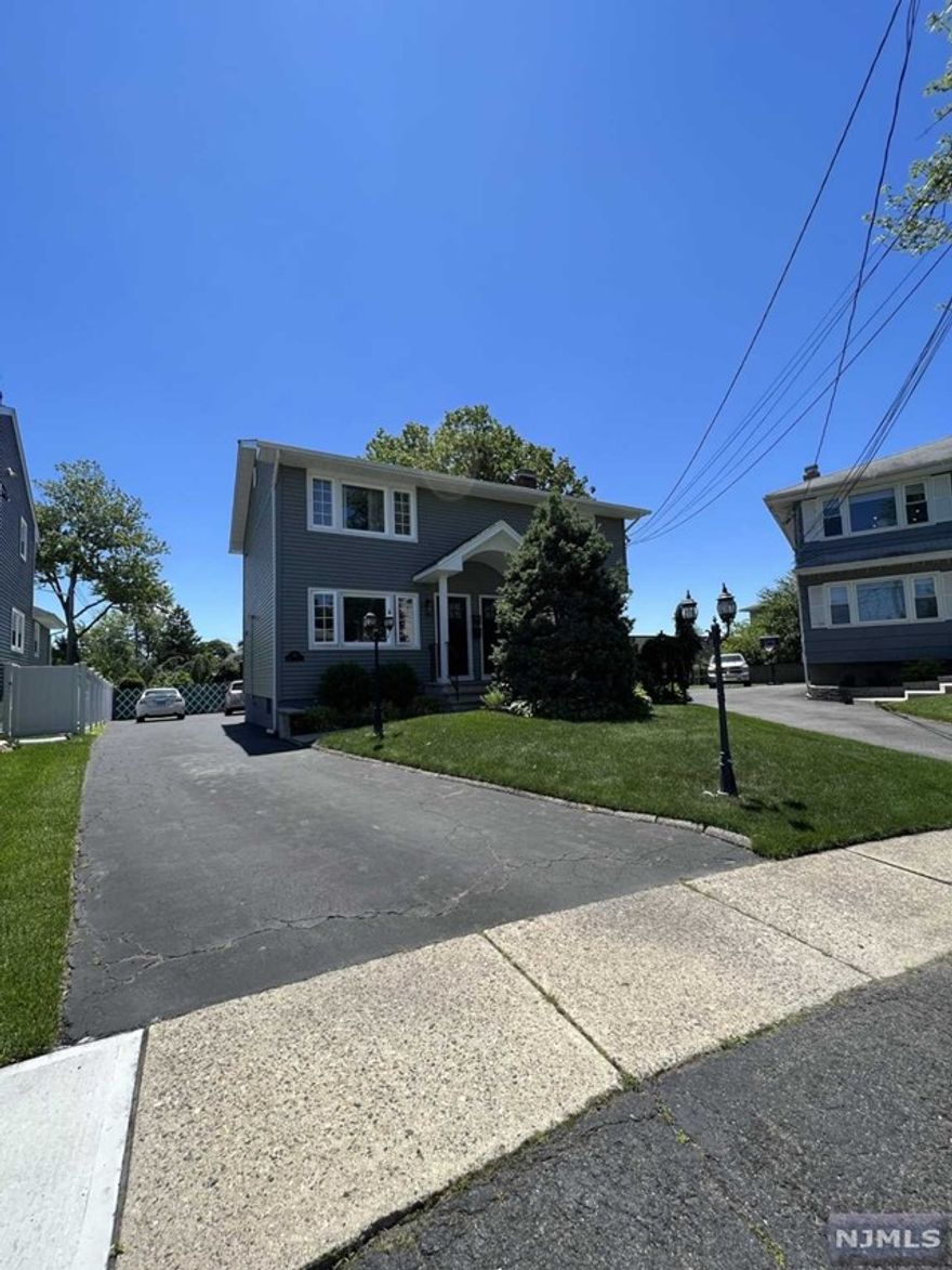 Spacious and sunny 3 bedroom and 1,5 bathroom apartment in the prime area of Saddle Brook. First floor offers: large living room, eat-in kitchen with access to the backyard with double deck, 3 good size bedrooms with closets and full bathroom. The basement contains family room , half bathroom, laundry room and access to the backyard. Huge backyard offers double deck and large driveway with at least 4 parking spots. Other amenities: hardwood floors, 2 zone central AC, baseboard heat, washer & dryer hookups in the basement, use of yard. Close to bus stops, major highways, and shopping. No smoking. A credit check and income verification.