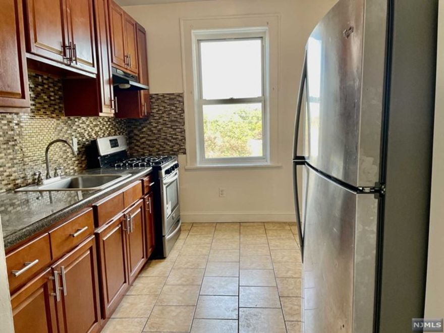 UPDATED ONE BEDROOM APARTMENT LOCATED ON THE FOURTH FLOOR OF A WALK UP BUILDING. HARDWOOD FLOORS THROUGHOUT. LAUNDRY ROOM LOCATED ON GROUND LEVEL. CONVENIENTLY LOCATED NEAR SHOPS AND NYC TRANSPORTATION. HEAT AND HOT WATER PROVIDED BY LANDLORD. TENANT RESPONSIBLE FOR COOKING GAS AND ELECTRIC. TENANT IS RESPONSIBLE FOR A 1.5 MONTH SECURITY DEPOSIT, A ONE MONTHS REALTOR FEE, AND $30 NTN FEE PAYABLE AT TIME APPLICATION IS MADE. MUNICIPAL PARKING AVAILABLE