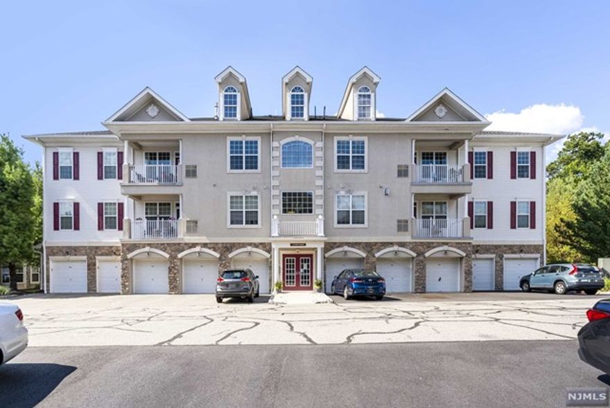 Your search ends HERE! This elegant unit, located at the Four Seasons, has everything you're looking for! Located in a gated community, just 12 miles west of Manhattan, this unit has it ALL! Upon entrance, you are warmly greeted by hardwood floors, fresh paint, and a bright and open floor plan seamlessly connecting the kitchen to the living room. The living room features a gas fireplace and has a private balcony, with unbelievable corner views. Meticulous attention to detail is presented in the eat-in kitchen with granite countertops, an upgraded backsplash, cherry wood cabinets, and brand-name appliances. The primary bedroom features a huge walk-in closet, and en-suite bathroom. Across the hall, you can find another bedroom (with an en-suite bath) and an in-unit laundry hook up. Access to the clubhouse offers everything you could want (and more): indoor/outdoor pools, fitness center, tennis court, and more.