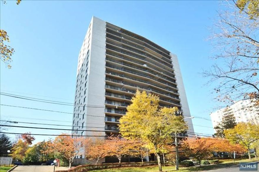 Rarely Available luxury Bristol House building! Located in the heart of Prospect avenue with NYC Express Bus at the door and Train nearby. Definitely a commuter's dream! Unit has one of the most stunning views of NYC Skyline from the huge 30+ ft balcony!! Updated Kitchen with newer appliances opens to the nice dining area and the Bright & Sunny living room with wall to wall windows, beautiful wood floors, large King Size Bedroom with a great closet space. Updated bathroom! Amenities include a beautiful outdoor saltwater pool, guaranteed security with 24 Hour doorman, Community Room, Exercise Room, indoor parking & Guest Parking. Units at Bristol House must be owner occupied for at least two years before being allowed to rent it out. One cat allowed and a small/medium size dog waiting list .