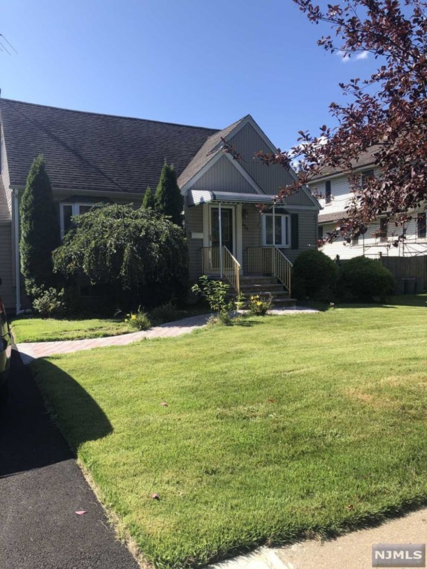 Welcome Home! LOCATION! LOCATION! LOCATION! This home offers 4 bedrooms 3 full bath with a screened-in porch at the back facing the yard and one car garage! Two spacious rooms on the first floor, and two bedrooms on the 2nd floor. The finished basement is spacious for recreation activities, or a bonus room for guests! Basement has a full bath and the laundry room! Plenty of storage too! The home is situated minutes from the schools and express bus to NYC, houses of worship, shopping and parks! Central AC will be put in the next few months.