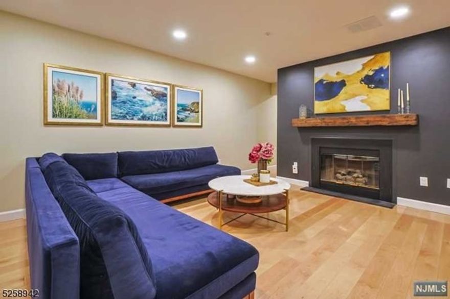 Step into this charming one-bedroom condo with a den, where warmth and tasteful design greet you at every turn. New hardwood floors throughout the space create a timeless and elegant atmosphere. The bedroom provides direct access to a serene green wooded area in the back, allowing you to step into nature right from your own bedroom. The recently updated kitchen is a highlight, boasting modern stainless steel appliances, generous storage space, sleek countertops, and a beautiful island that adds both functionality and style to the space. The island provides a perfect spot for meal preparation or casual dining.The warm and cozy patio is accessible through the den, offering a peaceful retreat for relaxation or outdoor entertainment. The condo's layout has been thoughtfully designed to maximize comfort and usability.Every detail of this condo has been carefully considered, from the flooring to the fixtures, resulting in a cozy and stylish ambiance.