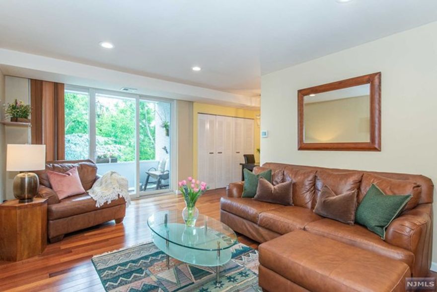 This beautifully updated 1bed 1bath Regency apartment is now available! This lovely unit features a gallery styled kitchen with separate dining area, spacious living room with floor to ceiling window/door sliders that open to the private balcony. Hardwood floors, central air and lots of natural sun light complete the interior of this great unit. Laundry & storage facility in premises and amazing community pool opened for the season.. right on time to enjoy the summer. Assigned parking for one vehicle is included and there is ample guest parking available. NYC Bus right outside the door and Delawanna train to Hoboken, Secaucus and NYC Penn connection is less than a mile away with the convenience of a commuter shuttle available just a few steps away! Close to restaurants, shops, parks and low taxes and HOA!! Downsizers, first time home buyers and investors' dream... it really suits them all!