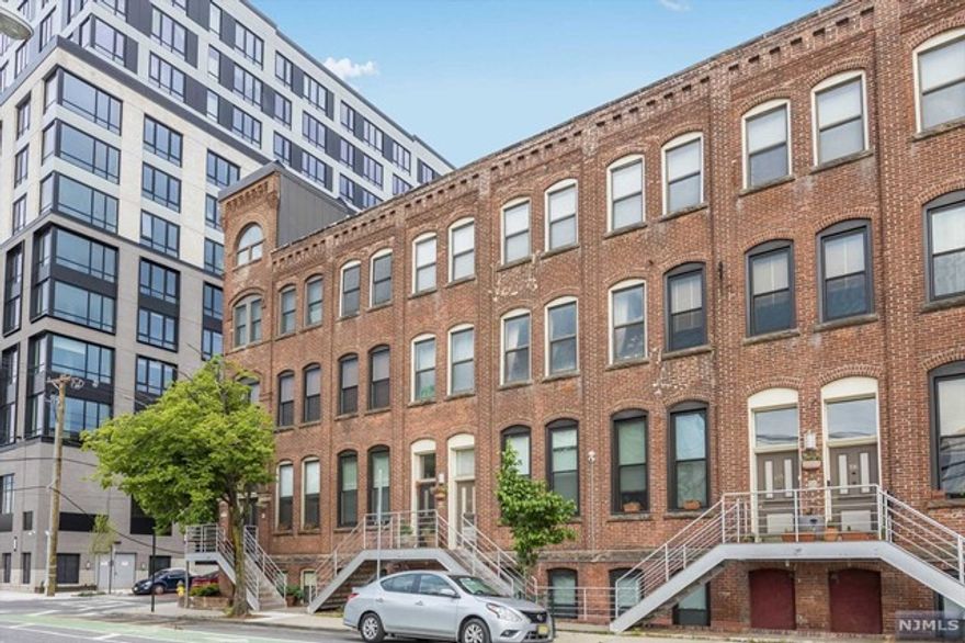 The building is pet-friendly and laundry is inside the unit. One dedicated parking space at 51 Bruen St. Please note that building security cameras/recording devices are in use for your safety. This building is not FHA approved and there is a $250 move-in fee to the Association at closing. Unit is also available for rent at $2750/mo. Check out the GSMLS listing 3857635 for more details. This is more than just a place to live it's a lifestyle. Your urban oasis awaits!