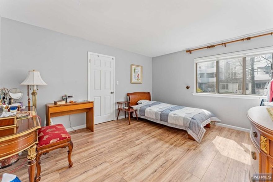 Welcome to 323 Sea Isle Key, a beautifully Yarmouth Model, 1006 sq.ft of living space, this unit has 2 bedrooms/1.5 baths. This townhouse has been totally upgraded with new baths, laminate hardwood floors throughout in 2018. The sleek kitchen has quartz countertopsd, glass backsplash, cabinets and stainless steel appliances. Glass sliders lead to private deck perfect to morning coffee.Relax on cozy nights by the fireplace in the living room. Don't forget the in unit washer/dryer, central a/c and heat. Situated in a peaceful setting, enjoy all the amenities of Harmon Cove.. gated community, resort like pool, tennis courts , playground and onsite NYC transportation