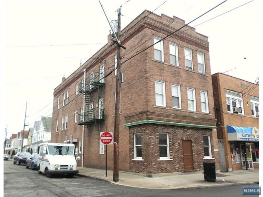 Landlord pays half fee. Tenant only pays other half. 3rd floor, 3 bed apartment with one car garage. Hardwood floors, renovated bath. Tenant pays utilities. No pets.