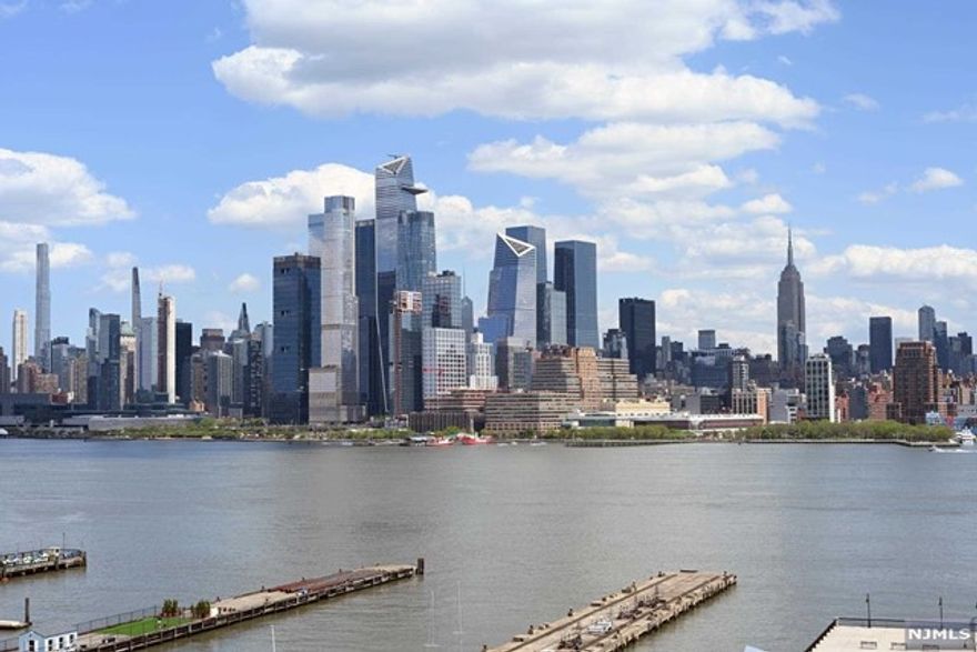 Experience stunning, unobstructed views of the Hudson River and New York City skyline from the GW Bridge to the Freedom Tower! Luxuriate in this pristine, expansive corner unit featuring a double living area opening onto an east facing terrace. This exceptional home is appointed with a dedicated dining space, bonus den/playroom and walk-in custom designed pantry. The open kitchen features Viking appliances and an oversized island. The primary bedroom suite has three beautiful exposures- south, east and west- a thoughtfully planned walk-in California Closet and private en-suite bathroom. The large second bedroom has outstanding views as well, and generous closet space. The oversized living space can easily be adapted for an additional bedroom. This fabulous home is located in Maxwell Place, a full amenity luxury hi-rise building including 24hr concierge, state of the art health club, rooftop pool with hot tub, theater/screening room, exclusive resident's club.