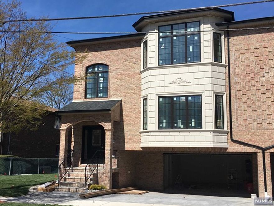 ALL BRICK DUPLEX IN ONE OF THE BEST AREAS IN PALISADES PARK STEPS AWAY FROM BROAD AND GRAND AVE...OVERSIZED CORNER DUPLEX WITH TERRIFIC LAYOUT, 9FT HIGH CEILINGS ON MAIN LEVEL, MODERN EAT-IN KITCHEN WITH GE STAINLESS STEEL APPLIANCES PACKAGE, WELL APPOINTED LIVING ROOM AND DINING ROOM, DELUXE TILES PACKAGE IN ALL BATHROOMS INCLUDING SPA LIKE MASTER BATHROOM WITH GLASS ENCLOSED SHOWER STALL, DOUBLE VANITIES, AND JACUZZI TUB...FINISHED RECREATION ROOM WITH SIDE ENTRANCE AND FULL BATH. CLOSE TO NYC TRANSPORTATION AND SHOPPING. AVAILABLE FOR JULY 1 MOVE IN.