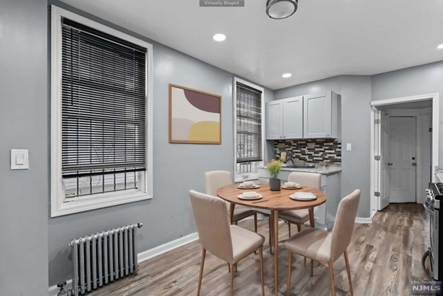 Welcome to first floor living! This beautifully renovated, freshly painted 2 bedroom 1 bath apartment offers tons of convenience and comfort. With parking available in the back of the house over a blacktop driveway, 922 Grove is a great deal! Rent includes heat and hot water. Book a tour today!