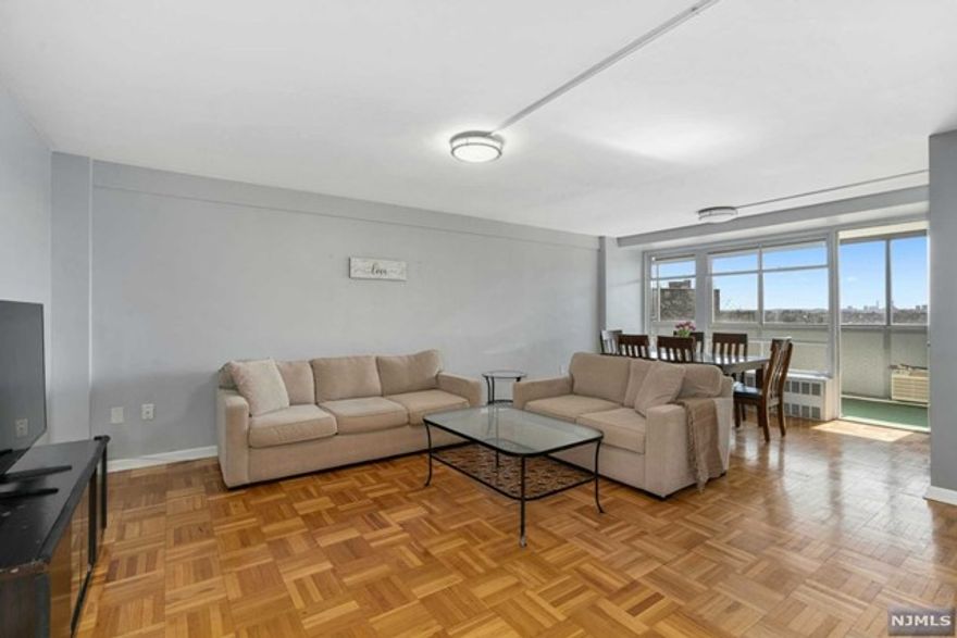 Stunning, massive 1800 sqft, 3 bed, 2 full bath condo with incredible sunlight all throughout the apt. Expansive, Eastward views towards NYC from enclosed balcony. Enjoy the open floor plan flowing into a renovated kitchen with new stainless steel appliances. The Primary suite includes a renovated en-suite bath and large walk-in closet with extra powder room. On the other side are 2 additional large bedrooms with big closets, large hallway with linen closet and updated full bath. Building features renovated basement, laundry room, 2 elevators, doorman and *2* assigned parking spots (1 indoor + 1 outdoor). NYC Express bus right outside front entrance. Monthly maintenance includes both parking spots, private storage room and ALL utilities. HOA Breakdown is: $873 association fees, $90 parking (one indoor, one outdoor)and $123 reserve build