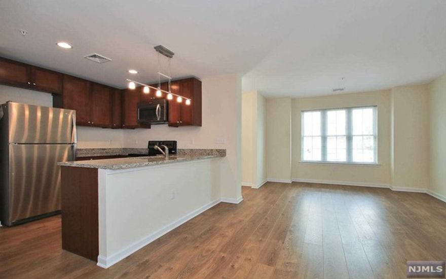 Amazing Townhouse Community in the Heart of Little Ferry, in a parklike setting, common area Garden/Barbeque area - beautifully landscaped - 1 parking spot included, optional 2nd spot avail. for extra fee $75.-/mo - public transportation / bus stop right at the corner with a quick commute to midtown Manhattan, via NJ Transit and also near all major highways - 2BR,2BTH - townhouse ranch style - 1100sqft, open concept layout with Kitchen/BreakfastBar to Living / Dining Area, luxurious finishes throughout, SS appliances, granite countertops, 42"maple wood cabinetr,y, large pantry for extra storage, great closet space - large master bedroom with en suite master bath and walk in closet, 2nd good size bedroom, full bath, own W/D in each unit, central air, HWF throughout - verizon Fios installed, recent New Construction - available for Jan 1st - Must See ! text/call LA for more info or a video tour