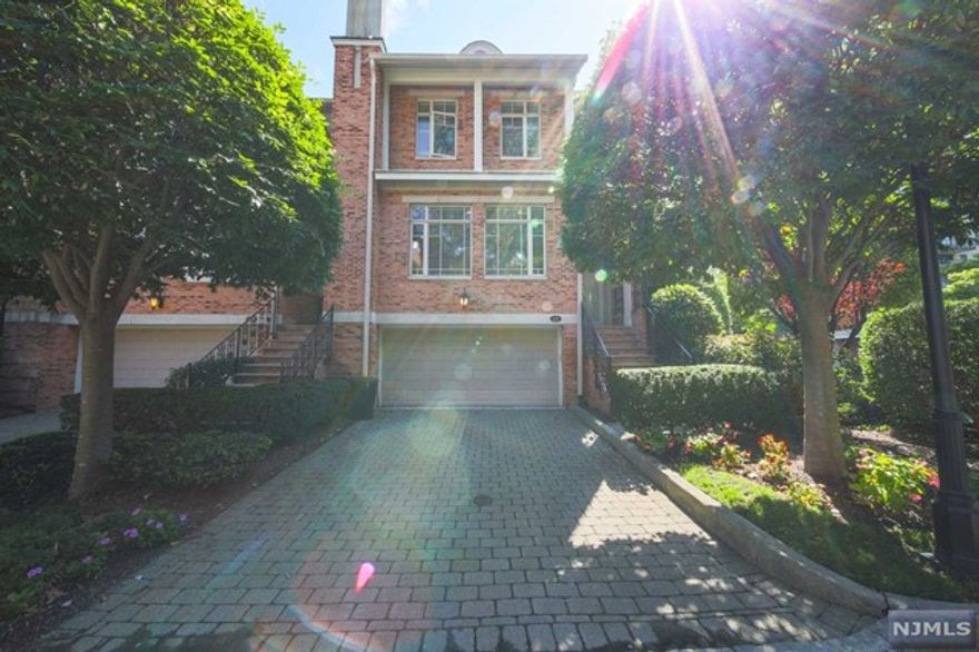 THIS MAGNIFICENT TRIPLEX TOWN HOUSE LOCATED ON RIVER FRONT COMPLEX.VERY BRIGHT& SUNNY ENDUNIT.SOUTH EASTERN EXPOSURE AND PARTIAL RIVER,SKY LINE & GW BRIDGE VIEW. OPEN STAIRCASE WITH CATHEDRAL HIGH CEILINGS AND SKYLIGHT. HARDWOOD FLOOR THROUGHOUT LIVING ROOM W/GAS FIRE PLACE, LARGE EAT IN KITCHEN W/MAPLE WOOD CABINETRY.GE PROFILES STAINLESS STEEL APPLIANCES, GRANITE COUNTER TOP WITH GLASS TILE BACK SPLASH, CERAMIC TILE FLOORS WITH FRENCH DOOR TO DECK, MASTER BED ROOM W/WALK IN CLOSET,MASTER BATHROOM W/ MARBLE FLOOR AND OVER SIZE JACUZZI TUB,SEPARATE STALL SHOWER. OTHER TWO BEDROOMS ARE GOOD SIZE WITH CUSTOM BLINDS. LOWER LEVEL HAS 4TH BEDROOM WITH FULL BATHROOM. DOOROUT TO PRIVATE PATIO, CENTRAL A/C, CENTRAL VAC, COMMUNITY FEATURES GATE HOUSE,RIVER FRONT WALKWAYS, POOL,CLUB HOUSE, CONVENIENCE FOR ALL SHOPPING, CLOSE TO MAJOR HIGHWAYS, EASY COMMUTE TO NYC DRIVING OR FERRY AND BUS. TENANT PAY $1000 REFUNDABLE MOVE IN FEE,$1500 non refundable