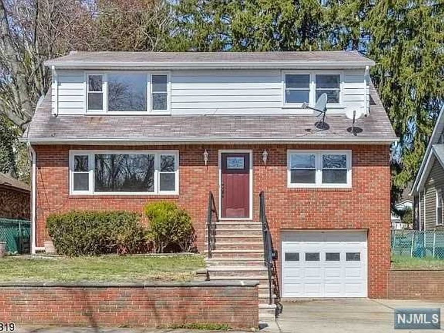 Newer Kitchen & Bath. 2nd. floor apartment with 2 bedrooms & 1 full bath. Hardwood floors throughout. Kitchen includes tile floor, new cabinets & granite tops. Pocket views of NYC from Living room. A fenced in rear yard is bbq ready! Laundry hooks ups are available. 1 car assigned parking in the driveway. Train Station only 1.2 miles away, come rent today! Tenant responsible for all utilities except water. No smoking. Cats allowed.