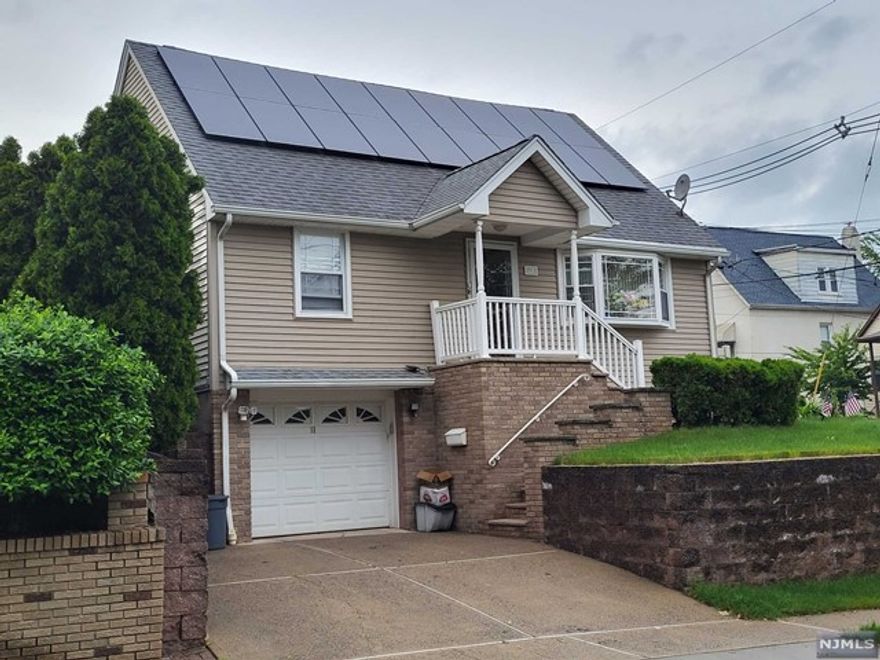 Smaller one bedroom efficiency apartment. Street parking only. Non-smoking house. Absolutely no pets. Small kitchen has gas stove and smaller refrigerator. Bathroom has a shower stall (no tub). Wall to wall carpeting (not subject to change).