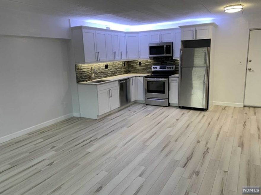 Be only the 2nd to rent this renovated Light and Airy Open Concept gut renovated (2 yrs ago) 1 BR on 2nd Fl .- Elevator Building- Marilyn Manor. NO SMOKING/NO PETS NYC bus & train nearby. Appears even larger than its 650 sq ft. Sunny Southwest Exposure. Bleached wood style floors throughout. Open concept - kitchen, living, dining .Shaker Style cabinets. Granite Counter Tops. grey brick back splash. Perimeter lighting under/above cabinets. SS appliances. 2 A/C units. Gorgeous Bathroom-All marble wall to ceiling. Grey tile floor. Stationary Glass door on tub. Large BR. W/D rm on floor. Lobby is currently in renovated. Free Assigned PARKING INCLUDED in rent. Tenant pays utilities. Unit owned by LLC-managing -member holds real estate lic. Required-$250.00 Move in Fee. renter's insurance. ACH for drafting rent required . -1st month rent, 1 1/2 month sec. dep. 1 month Broker fee. NO PETS/NO SMOKING.min income $70,000.