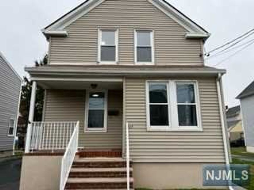 It's here! This highly desirable 3-bedroom, on the 1st floor of a beautiful 2-family home in Saddle Brook. New eat-in Kitchen, new Bathroom, new wood floors and trim. Plus - Laundry hook-up in apartment. Allocated garage parking + 1-car space on premises. Allocated yard for use. Rear basement storage. Close to NYC and many major highways such as Routes 80, 46, 17, 4 and the Garden State Parkway. NJ Transit Trains within close distance.