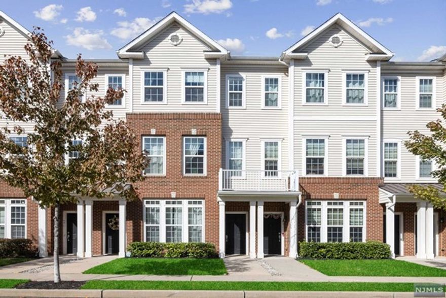 Welcome to the Wesmont in Wood Ridge! Comfort and convenience is exuded in this modern 2 bed 2.5 bath sunlit townhouse located in a community offering shopping, sports fields, playgrounds, dog parks, and NJ transit all at arms reach. Walk-in to your foyer from the garage or greet your guests from the opposite entrance and head up to the light and bright main living level complete with LR, DR, updated kitchen, powder room and balcony. Boasting beautiful flooring, ss appliances, granite, and ample storage, you will feel content here whether working from home or entertaining! Upstairs, find a spacious primary suite with walk-in closet, an ample 2nd bedroom, additional full bath, and substantial loft space large enough to be a 3rd bedroom. Don't miss this beauty!