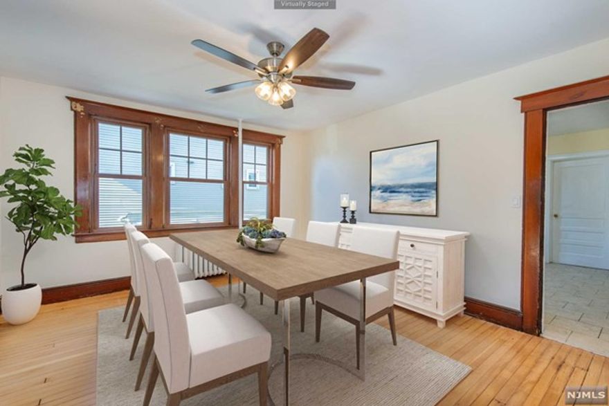 Newly renovated first floor apartment in a lovely neighborhood! This large apartment has newly refinished hardwood floors throughout, walnut trim, and an extra large living area which includes an eat-in kitchen, formal dining room, living room, and sunroom with French door entry! Both bedrooms have large closets. There are multiple ceiling fans and large windows letting in tons of sunlight! Extra storage is available in a hallway closet and the shared basement! Laundry hookups are available in the basement and owner will allow one car parked in the driveway.